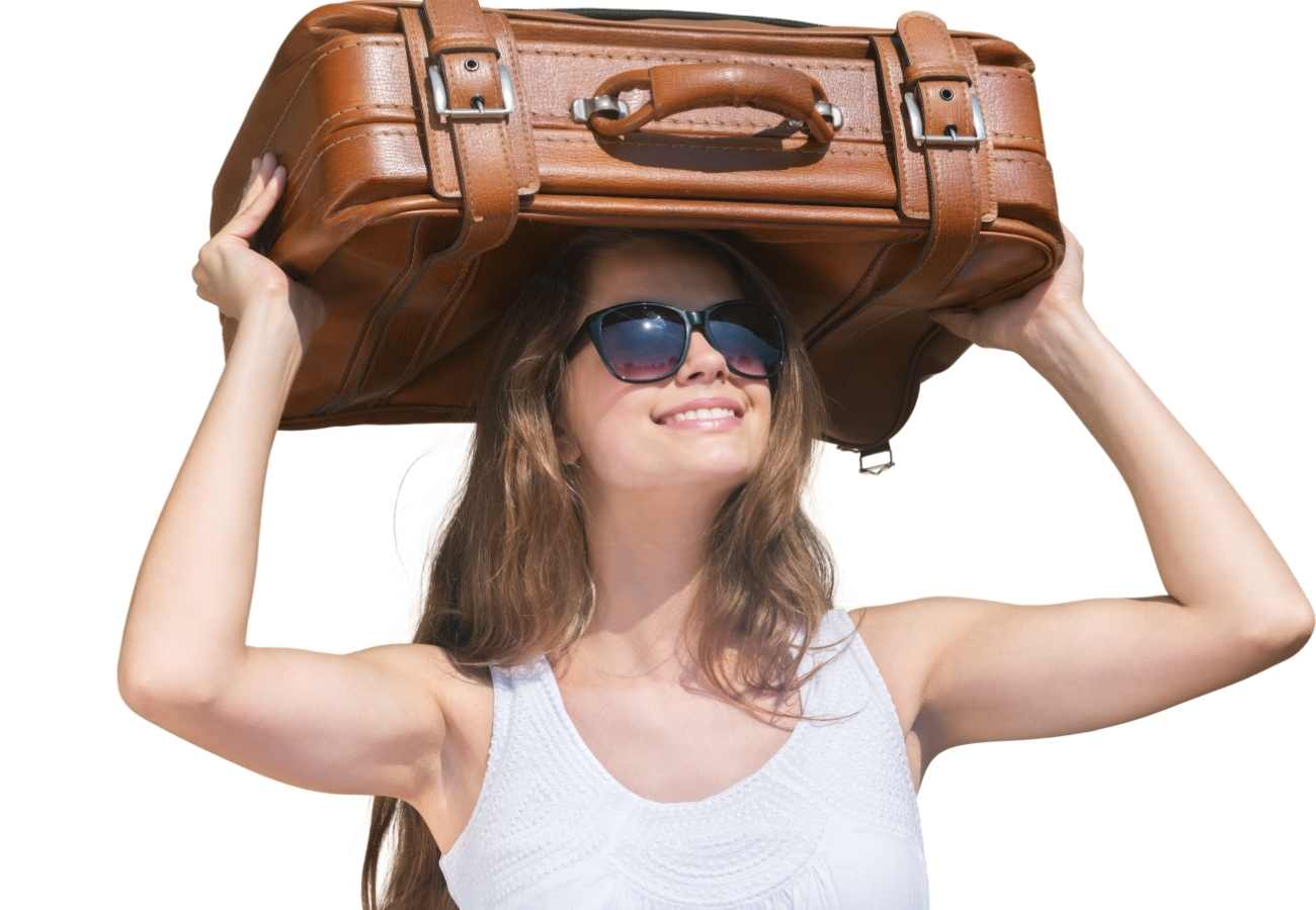woman with a suitcase on her head