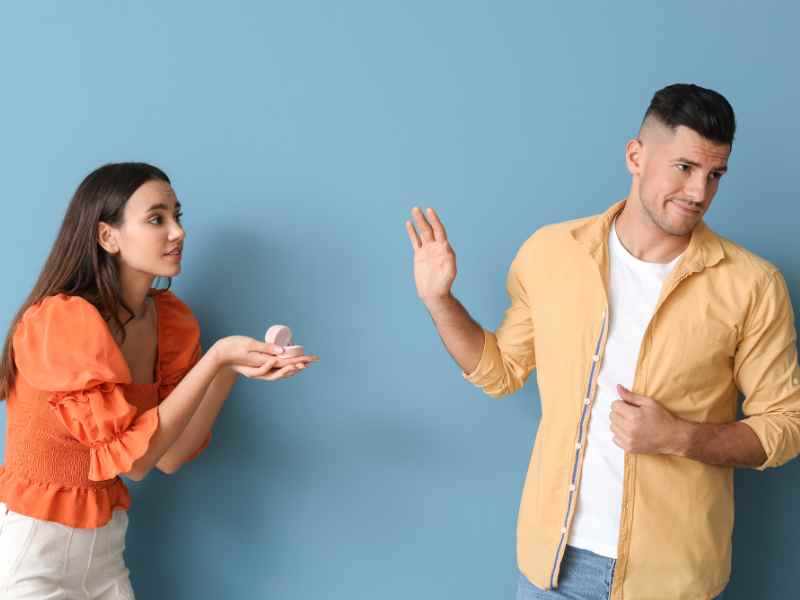man turning down girlfriend suggesting marriage