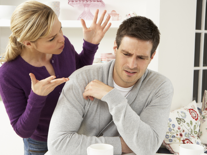 woman verbally abusing man